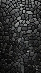 Polished rounded porphyry stones in an organized pattern. - obrazy, fototapety, plakaty