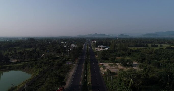 Aerial view transport main rural highway road moorning sunrise asphalt road transport industry