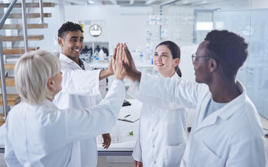 Science, high five and team with success in laboratory for celebration, support or motivation. Teamwork, medical research and scientist huddle for collaboration, happiness and group of doctors in lab