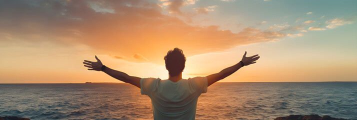 Panorama back view of happy excited man raising arms up to blue sky, male winner traveler enjoying summer sunset at the beach, life style freedom concept
