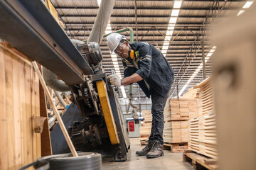 Fototapeta premium Woodworkers operate machines, tend lathes to cut, shape wood fixtures in manufacturing process