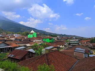 Obraz premium Panorama of residential area in rural Kaliangkrik Magelang village at the foot of Mount Sumbing, Central Java