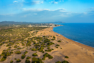 Aerial drone view over sand dunes close to Lake Korission. It is located in the southern part of Greek island of Corfu, Greece.