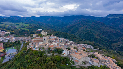 Obraz premium Aerial view of the city Montalbano Elicona, Italy, Sicily, Messina Province. Aerial view of the medieval town of Montalbano Elicona with the castle of Federico II, Italy, Sicily.