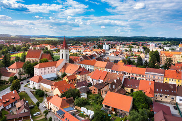 Fototapeta na wymiar Blatna town near Strakonice, Southern Bohemia, Czech Republic. Aerial view of medieval Blatna town surrounded parks and lakes, Blatna, South Bohemian Region, Czech Republic.