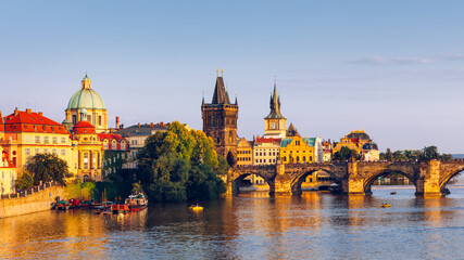 Scenic view of the Old Town pier architecture and Charles Bridge over Vltava river in Prague, Czech...