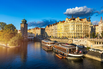 Scenic embankment in Prague city; Historical center of Prague, buildings and landmarks of old town,...