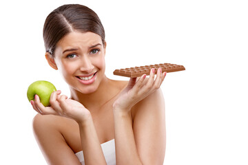 Isolated woman, chocolate and apple in portrait with confused face for choice by transparent png...