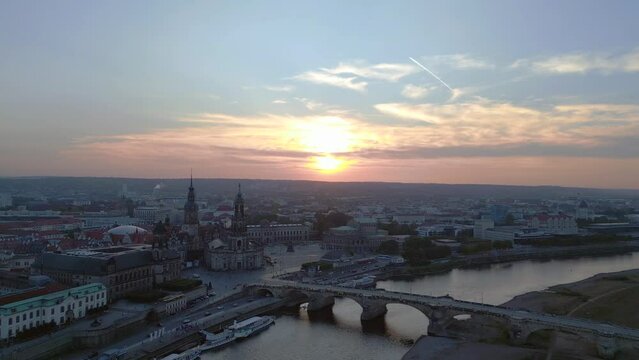 Lovely aerial top view flight 
Sunset city Dresden Church Cathedral Bridge River. panorama overview drone
4k Landscape footage