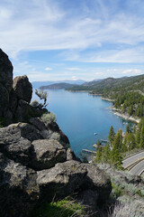 Scenic view of mountains and forested coastline of the East Shore of Lake Tahoe from the top of...