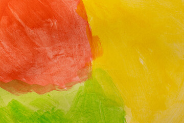 Close up of green, yellow and red paints with copy space background