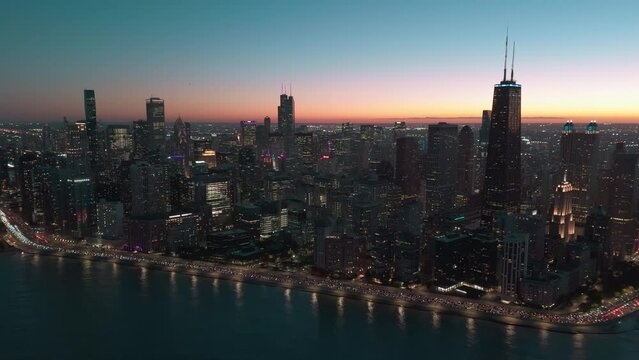 Chicago Downtown skyscraper in the colorful sunset time. Drone wide footage.