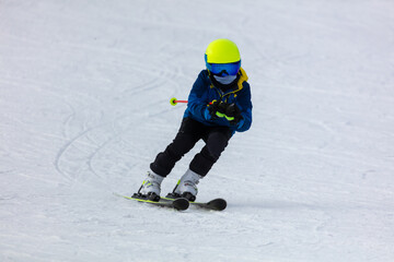 Fototapeta na wymiar Men ski on snow in winter