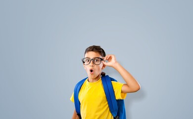 Smiling child student boy with mathematical symbols