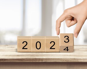 Starting 2024 new year on wooden blocks.