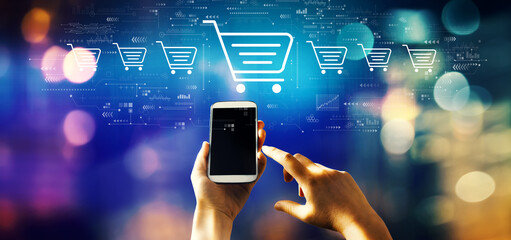 Online shopping theme with person using a smartphone