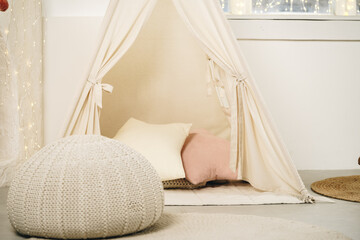 Children's room with play tent teepee and pillows © fotofabrika