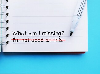 Pen writing on notebook -  I'm Not Good at This - crossed off to What Am I Missing? - overcoming...