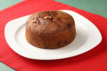Homemade cashew plum cake,Plum cake made with dried fruit, raisins, cashew nuts, almond etc. Tasty home made cake flavored with cinnamon and spices for sale on Christmas and new year Kerala India.