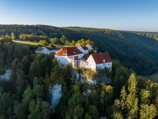 Fototapeta na wymiar Luftbild von der Burg Wildenstein bei Leibertingen von der Morgensonne angestrahlt