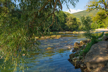 The River Una as it passes through Kulen Vakuf village in the Una National Park. Una-Sana Canton, Federation of Bosnia and Herzegovina. Early September