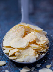 Dried garlic flakes close-up