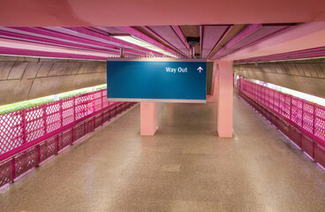 Way out sign in the Pink train station in Singapore