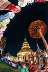 the pagoda of Wat Phra That Hariphunchai, Lamphun during Loy Krathong festival