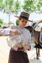 Stylish woman with cups of refreshing water on street