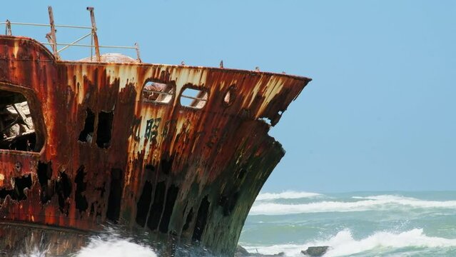 Rusty weather-beaten Meisho Maru No 38 shipwreck on Agulhas coastline, telephoto