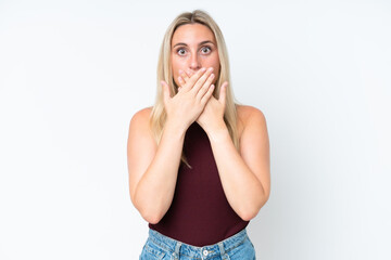 Young caucasian woman isolated on white background covering mouth with hands