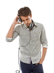 Fashion, confident and young man with headphones and casual, stylish and trendy outfit. Serious,...