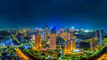 Fototapeta na wymiar Panorama of Jakarta city and Traffic at night, Indonesia.