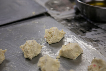 Preparing deep fried tofu balls at a Tofu Shop in Shizuoka, Japan.
