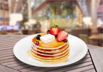 A stack of fresh sweet fluffy pancakes