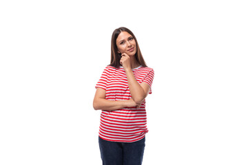 charming pretty 35 year old european lady in a red striped t-shirt on a white background with copy...