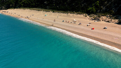 Greek Islands Paradise: Sun, Sand, and Sea - A Breathtaking Beach View Captured in the Idyllic Splendor of the Aegean