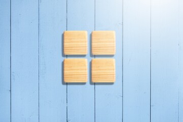 Basic mathematical symbols on wooden cubes for business concept.