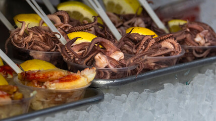 Calamari dish on a fish market