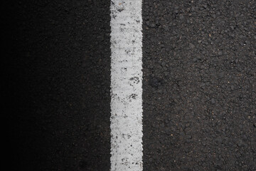 Close-up view of the black asphalt