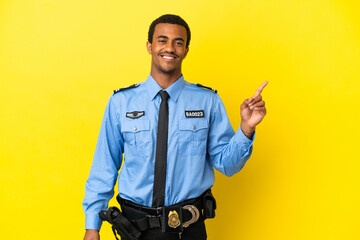 African American police man over isolated yellow background showing and lifting a finger in sign of the best