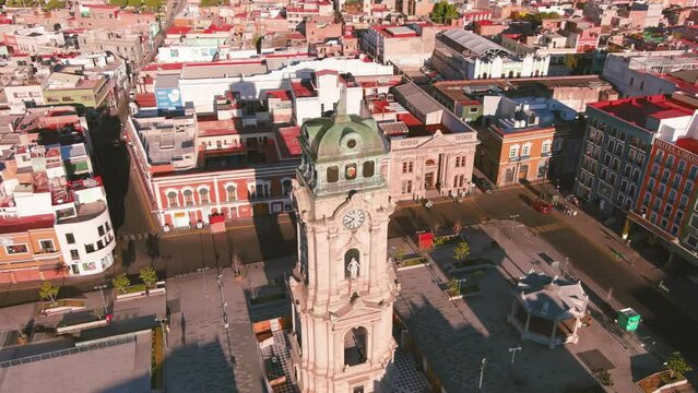 Mexico, Pachuca: Aerial view of capital city of Mexican state of Hidalgo at sunrise, Monumental Clock (Reloj Monumental de Pachuca) - landscape panorama of Latin America from above