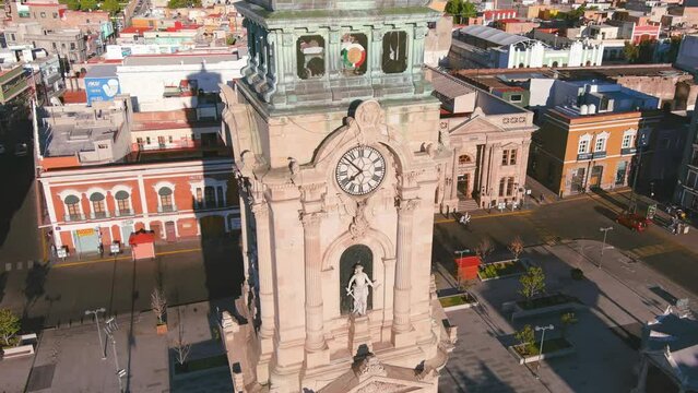Mexico, Pachuca: Aerial view of capital city of Mexican state of Hidalgo at sunrise, Monumental Clock (Reloj Monumental de Pachuca) - landscape panorama of Latin America from above