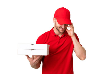 Pizza delivery man with work uniform picking up pizza boxes over isolated chroma key background...