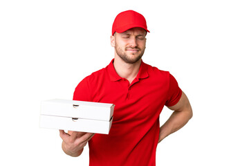 Pizza delivery man with work uniform picking up pizza boxes over isolated chroma key background suffering from backache for having made an effort