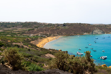 Ramla Beach seen from Tal-Mix Cave in Gozo, Malta