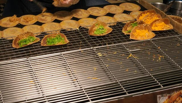 Making Khanom Buang (Thai crispy pancakes or crispy crepes), Traditional Thai snack