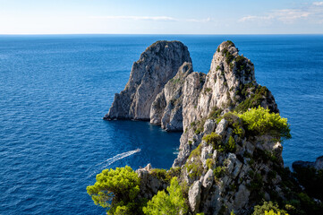 Rock formations Faraglioni, Island Capri, Gulf of Naples, Italy, Europe. - obrazy, fototapety, plakaty