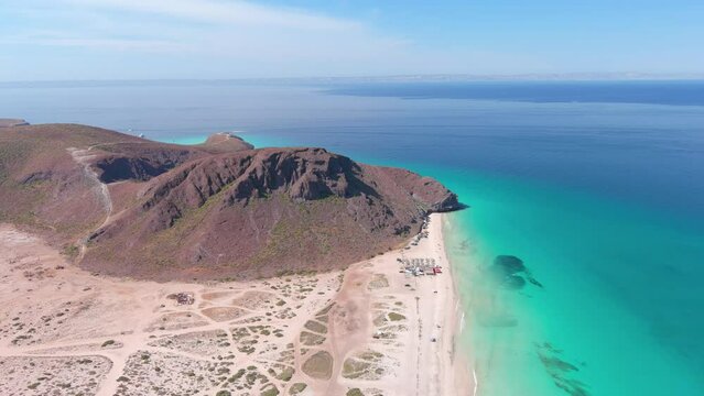 Mexico, La Paz: Aerial view of Tecolote Beach (Playa El Tecolote) with clear turquoise waters of Gulf of California - landscape panorama of Latin America from above