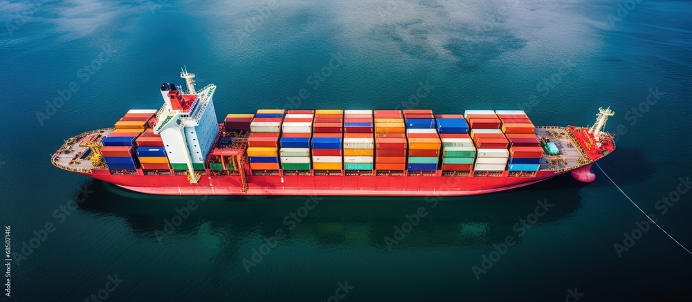 Poster International trade conducted by shipping containers viewed from above on a world map copy space image